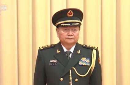 习铁杆张又侠表情严峻。