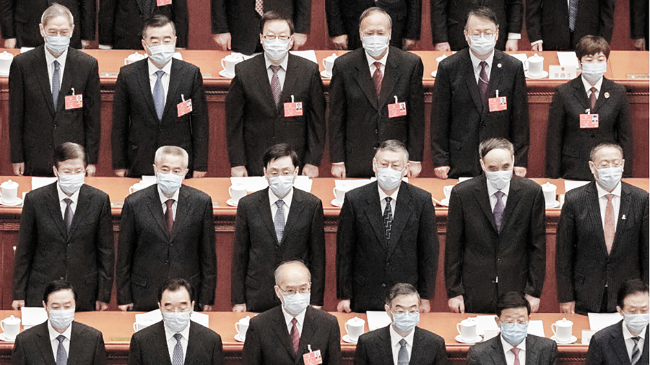 大陆官员在会议现场（Kevin Frayer/Getty Images）