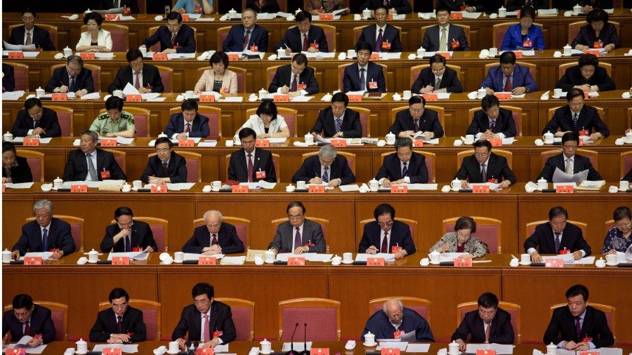 中共官员参加“两会”。（图片来源：Ed Jones/AFP/GettyImages）