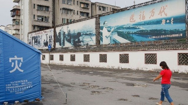 中共喉舌媒体《人民日报》刊发文章只字不提习近平。(图片来源:China Photos/Getty Images)