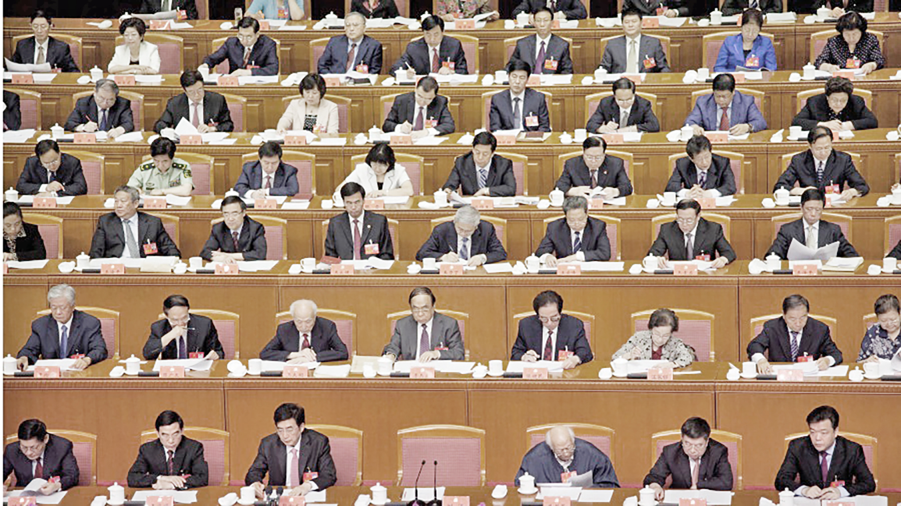 参加两会的官员（Ed Jones/AFP/Getty Images）
