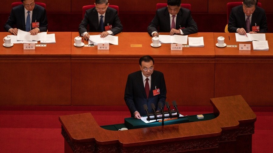 中国总理李克强作政府工作报告,宣布了今年GDP增长目标为5.5%。