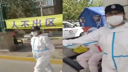 近日黑龙江省大庆市一小区100多名社区工作人员和志愿者吃盒饭集体食物中毒,但送医时被阻拦,女门卫称,没通行证就死小区。(图片来源:视频截图)