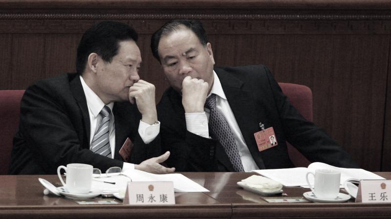 周永康(左)(图片来源:Feng Li/Getty Images)