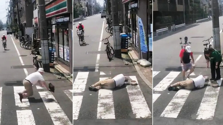 日本街头,一名老人摔倒在地,经过的路人前来帮助老人。
